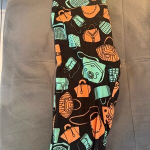 LuLaRoe Black Leggings with Orange and Green Print